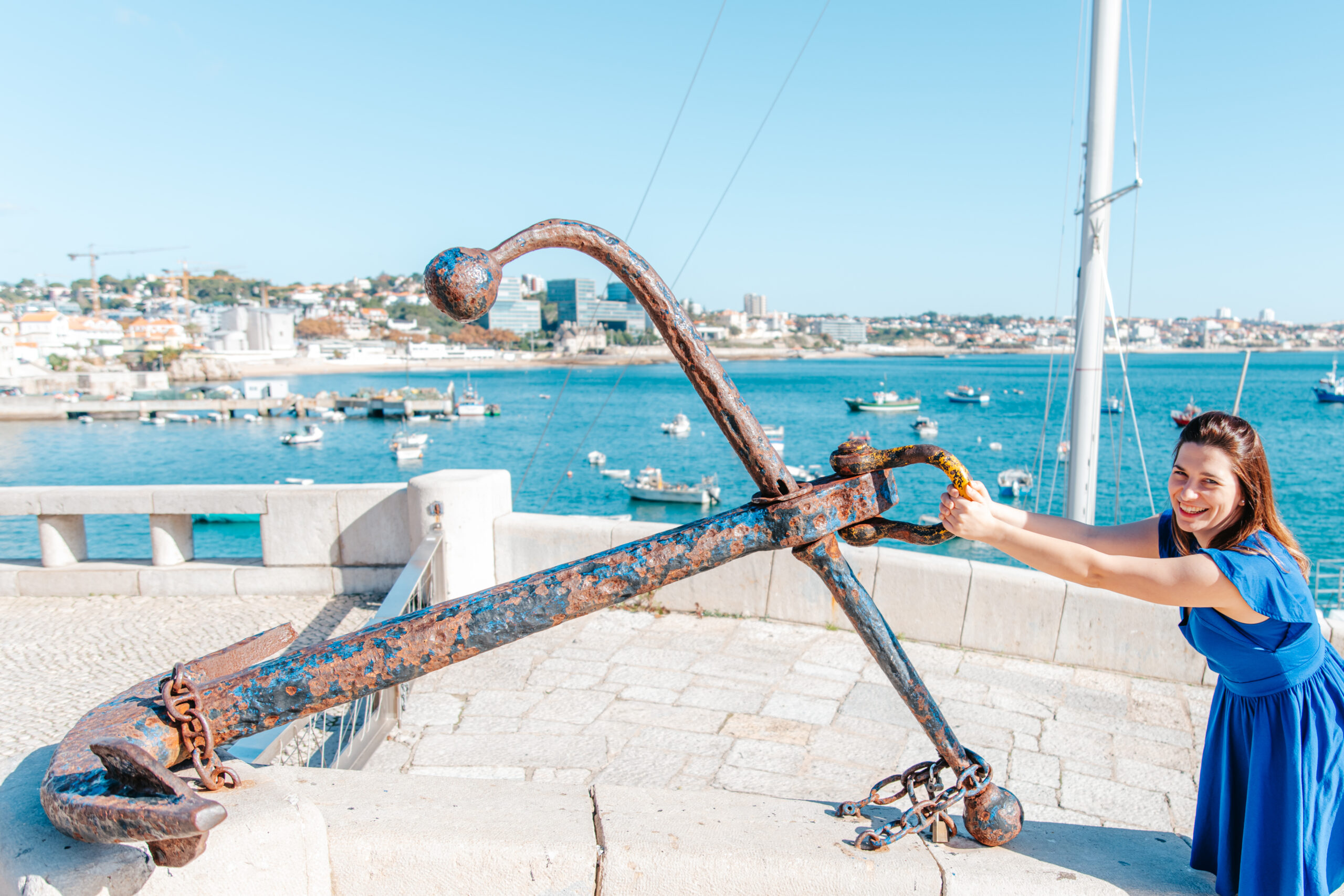 girl holding onto the anchor picture